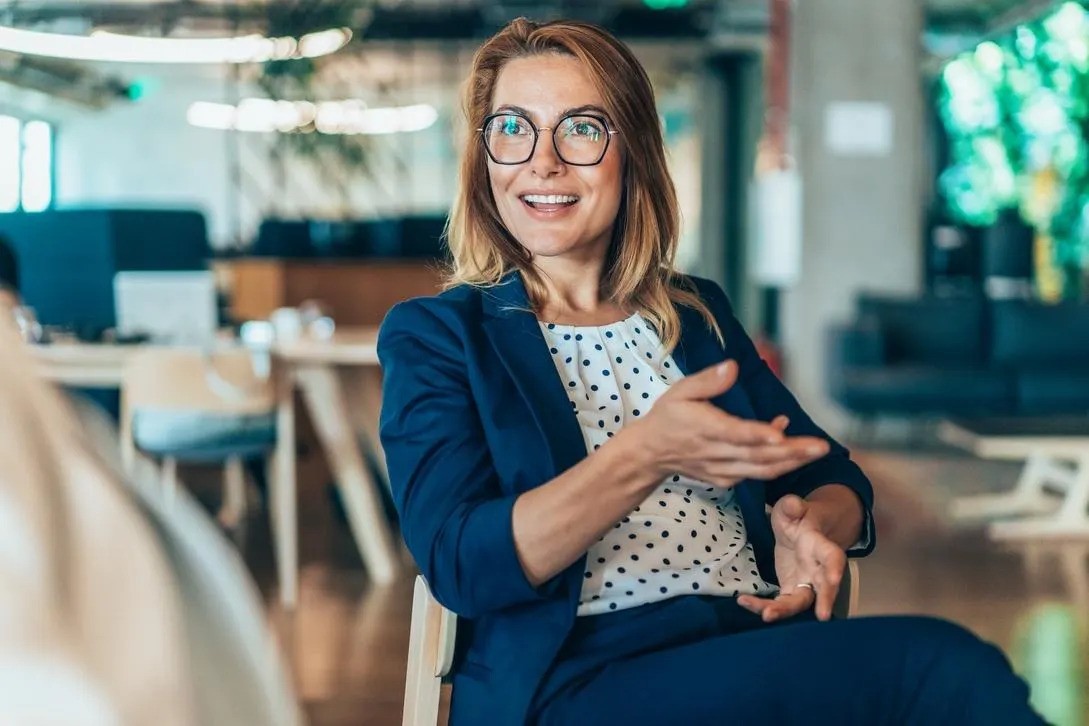 Executive candidate discussing evidence during an interview