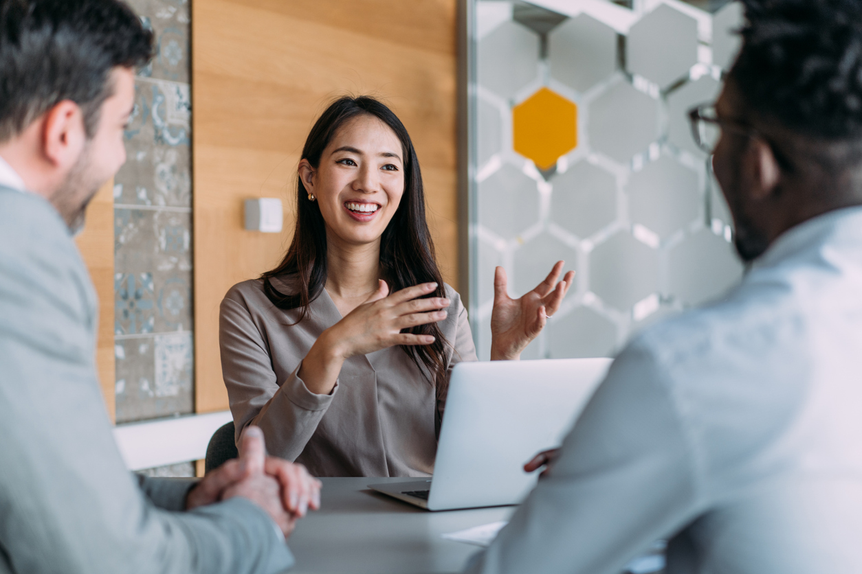Asian female executive team discussion