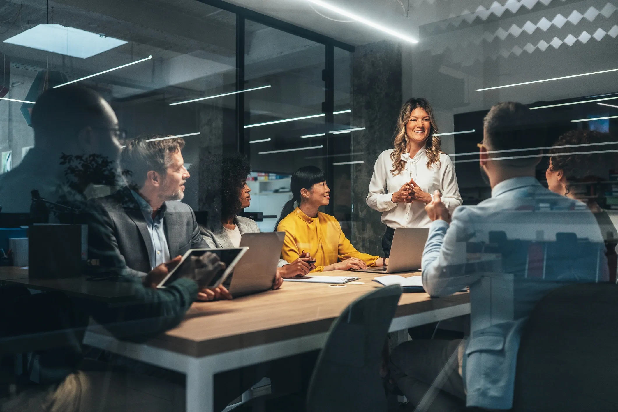 Female executive leading diverse team