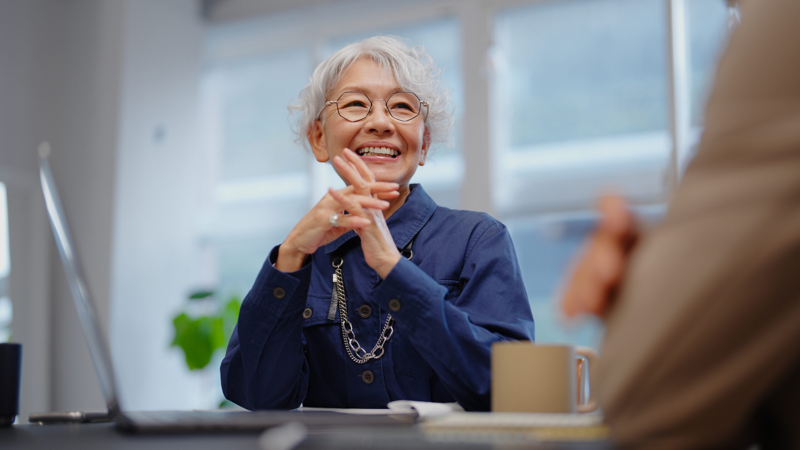 Senior female executive office conversation