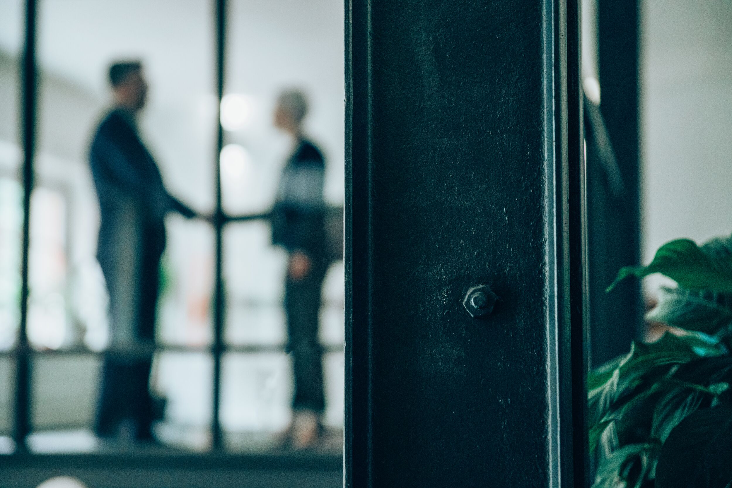Steel column private office conversation
