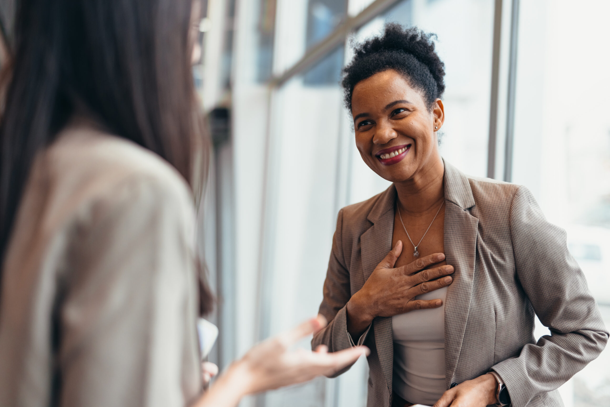 Female executive in a trusted business conversation