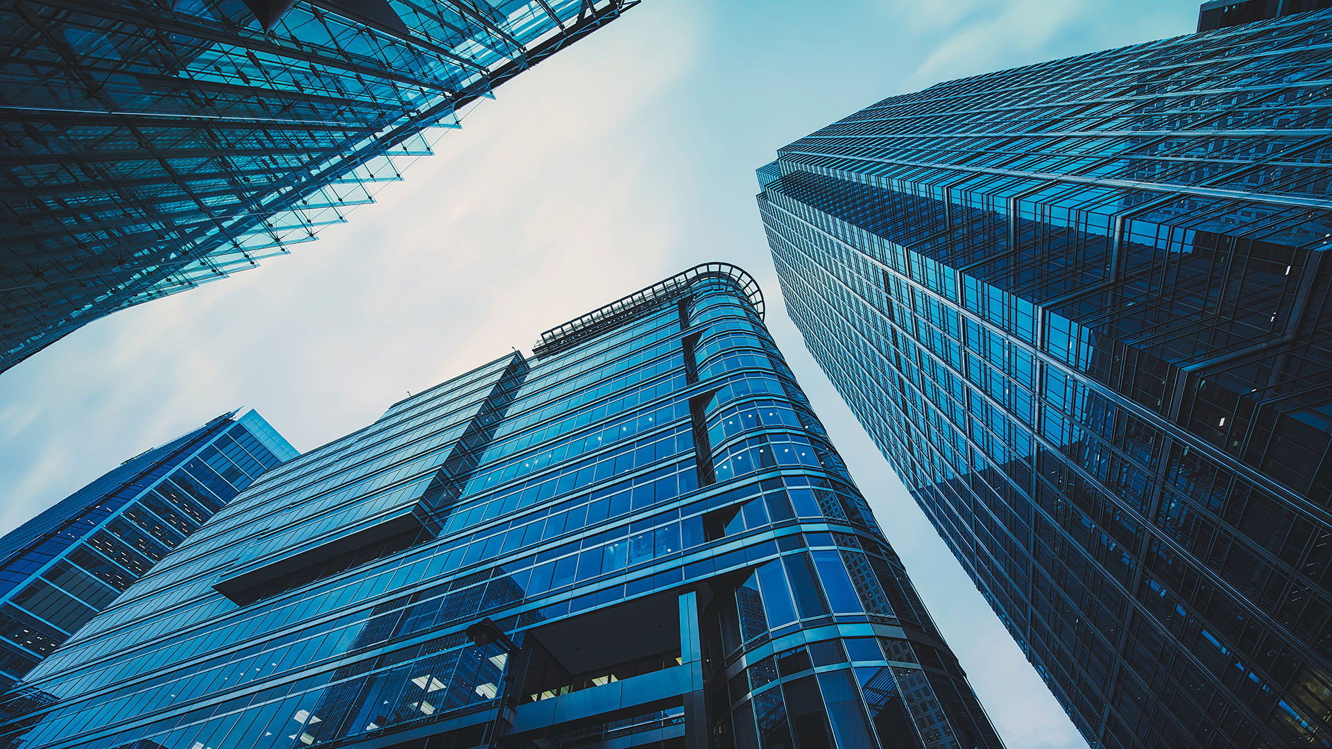 Modern glass office buildings viewed from below
