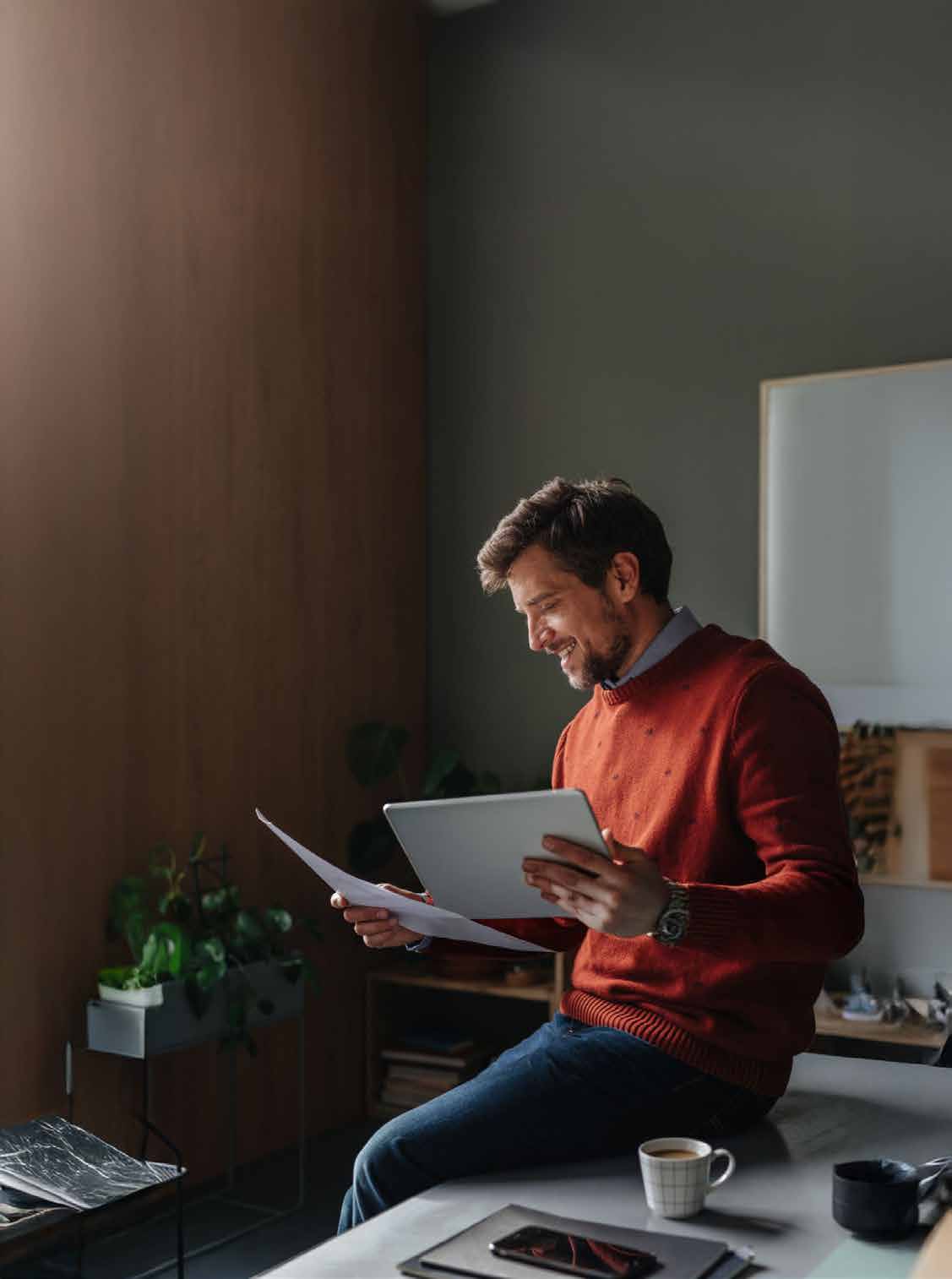 High-performing executive reviewing documents away from the active job market