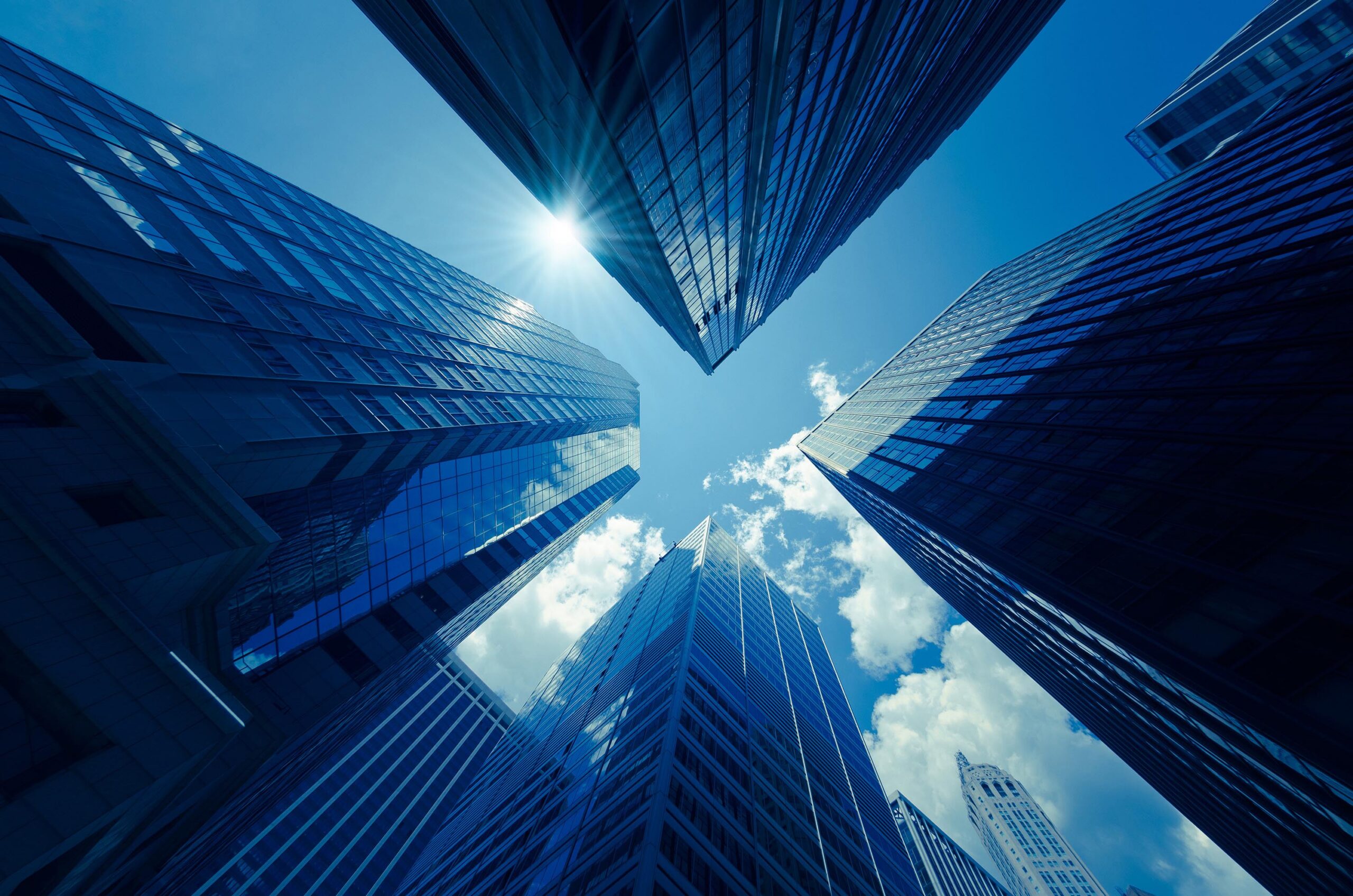 Blue office towers rising into the sky